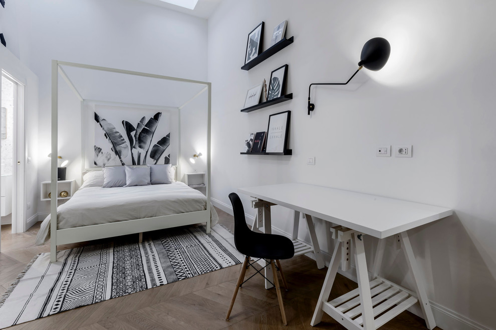 Medium sized contemporary bedroom in Milan with beige walls, light hardwood flooring and brown floors.