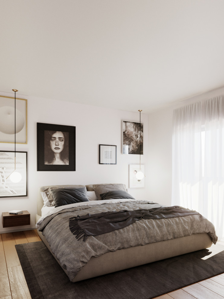 Mittelgroßes Modernes Hauptschlafzimmer ohne Kamin mit weißer Wandfarbe und hellem Holzboden in Sonstige