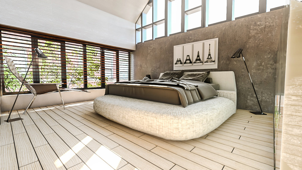 Mittelgroßes Industrial Schlafzimmer im Loft-Style mit bunten Wänden, braunem Holzboden und beigem Boden
