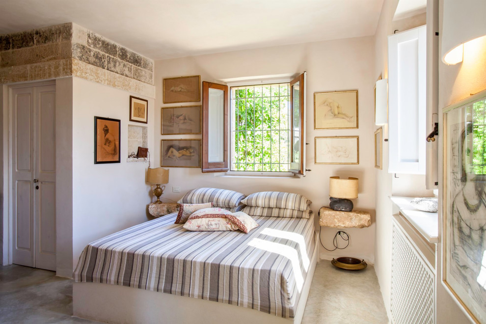 Inspiration for a mediterranean bedroom remodel in Milan