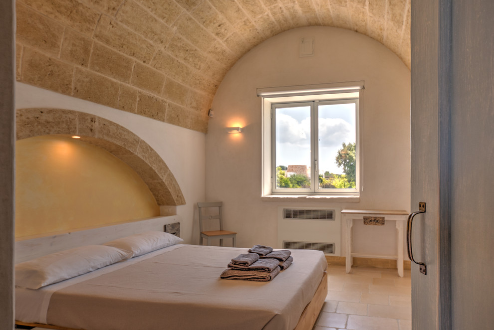 This is an example of a mediterranean bedroom in Bari.