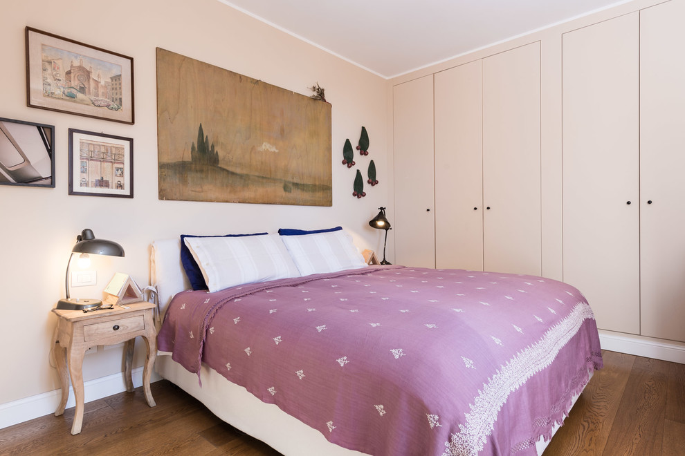 This is an example of an eclectic bedroom in Rome.
