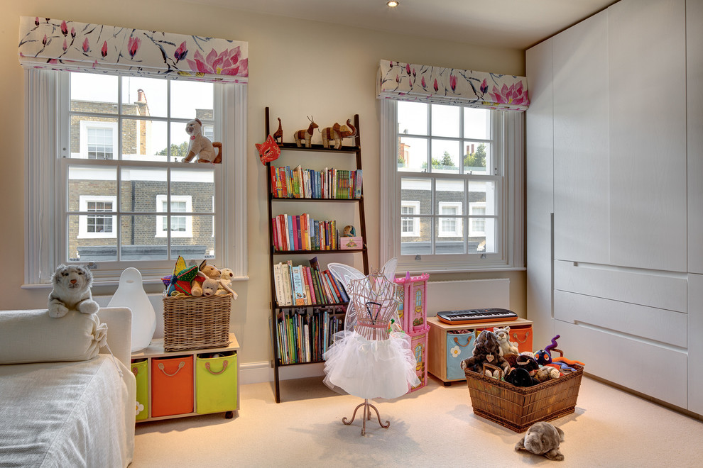 Inspiration for a contemporary girl carpeted kids' room remodel in London with yellow walls