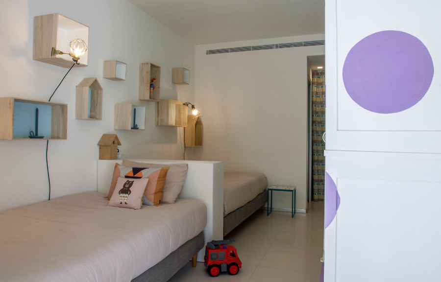 Design ideas for a contemporary kids' bedroom in Bologna.