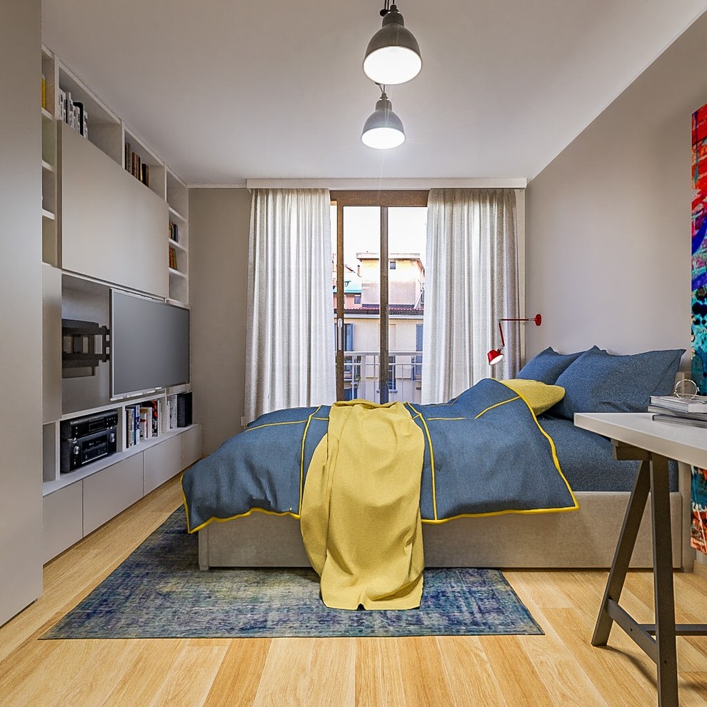 Idee per una cameretta per bambini contemporanea di medie dimensioni con pareti beige e parquet chiaro