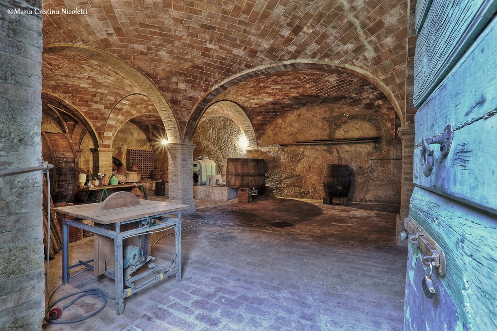 Inspiration for a cottage wine cellar remodel in Florence