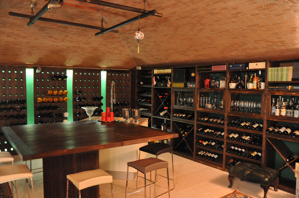 Design ideas for a large classic wine cellar in Venice with display racks.