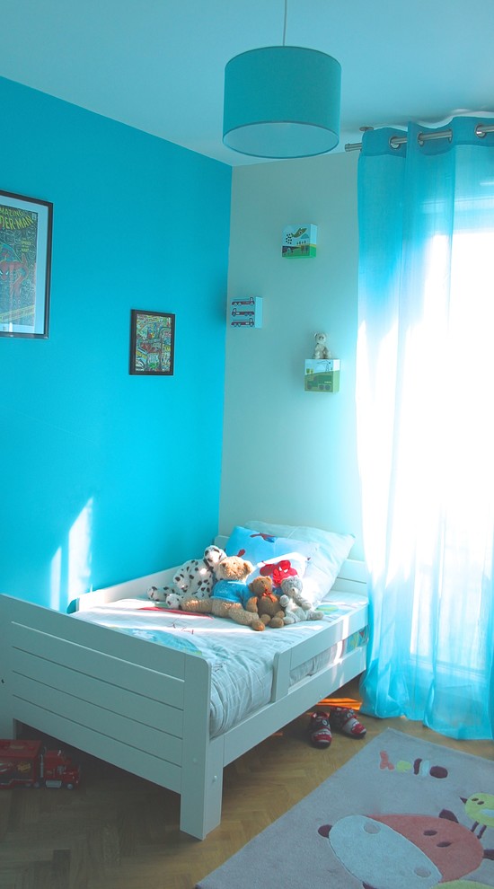 Kids' room - modern boy light wood floor kids' room idea in Paris with blue walls