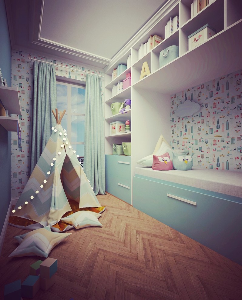Aménagement d'une petite chambre d'enfant de 4 à 10 ans contemporaine avec un mur bleu, parquet clair et un sol marron.