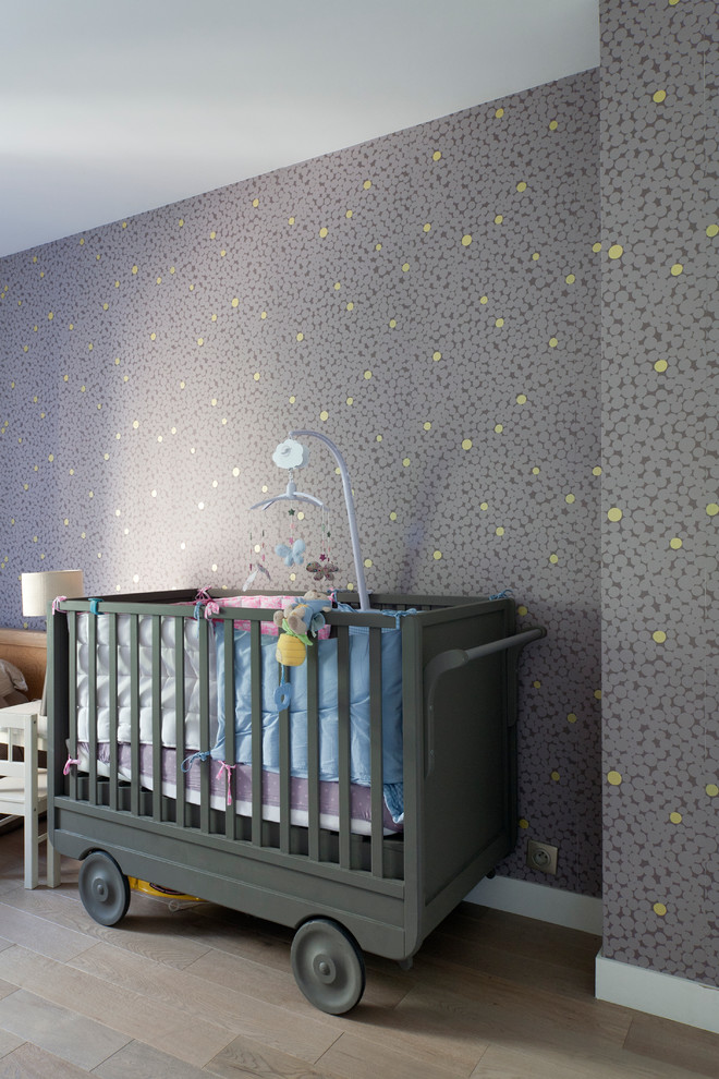 Example of an eclectic nursery design in Paris