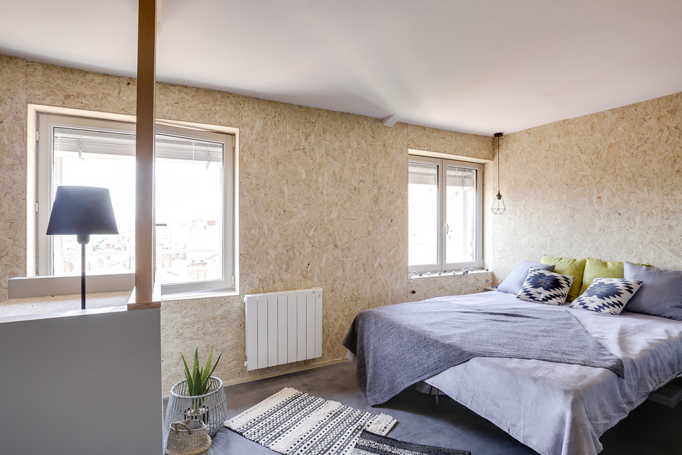 Idées déco pour une chambre parentale contemporaine de taille moyenne avec un mur beige et un sol gris.