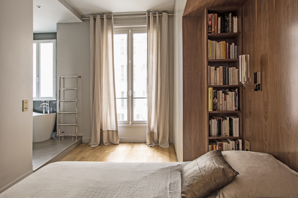 Photo of a medium sized contemporary bedroom in Paris.