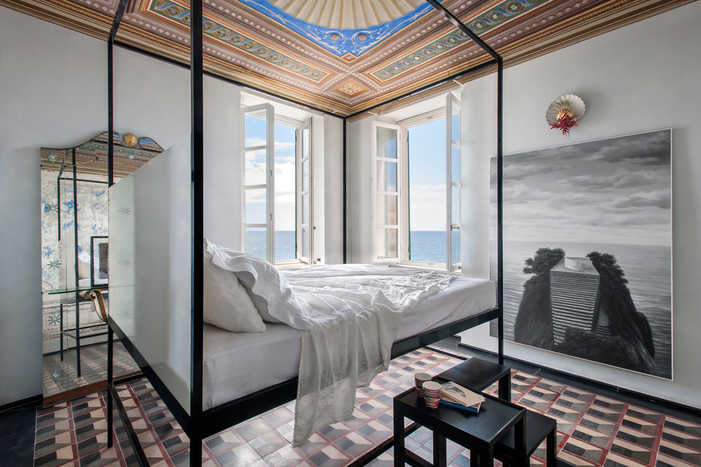 Inspiration for a mediterranean bedroom remodel in Milan with white walls