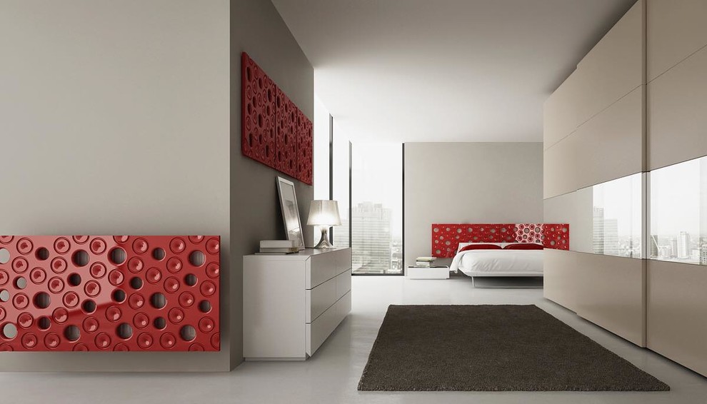 Photo of an expansive contemporary master bedroom in Marseille with red walls and no fireplace.