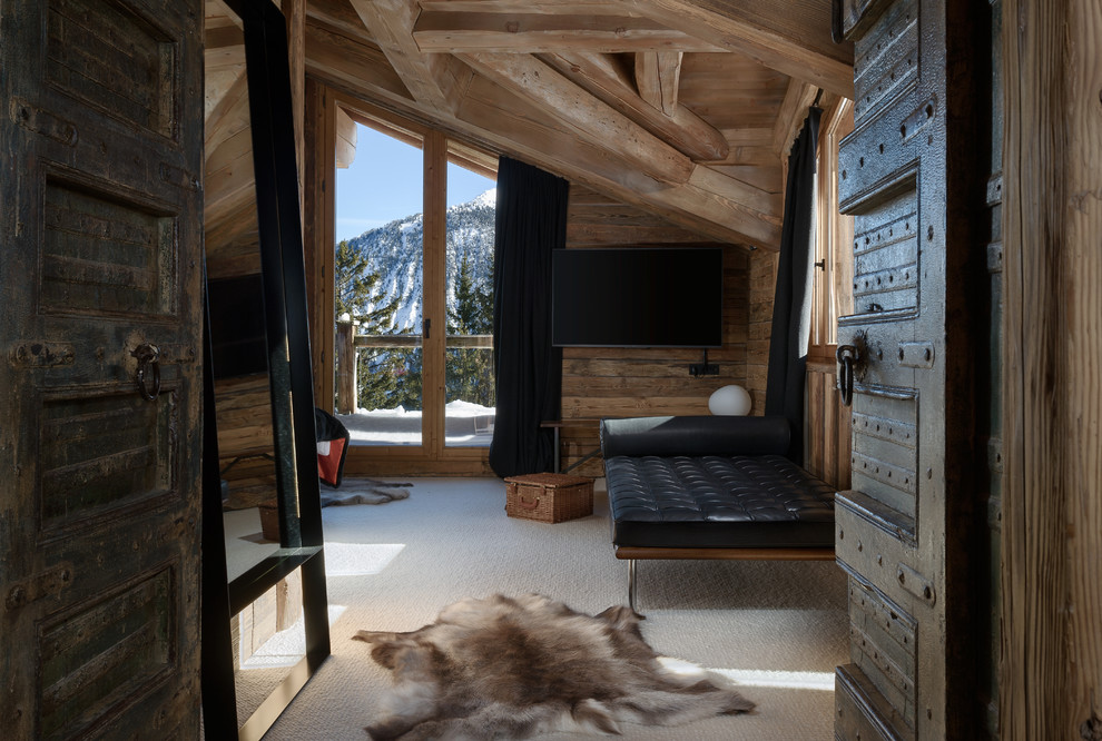 Inspiration for a rustic bedroom in Other with brown walls, carpet and white floors.