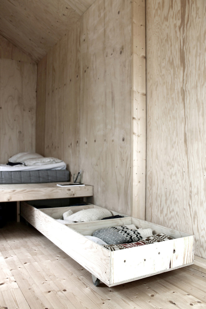 ストックホルムにある小さな北欧スタイルのおしゃれな寝室のインテリア