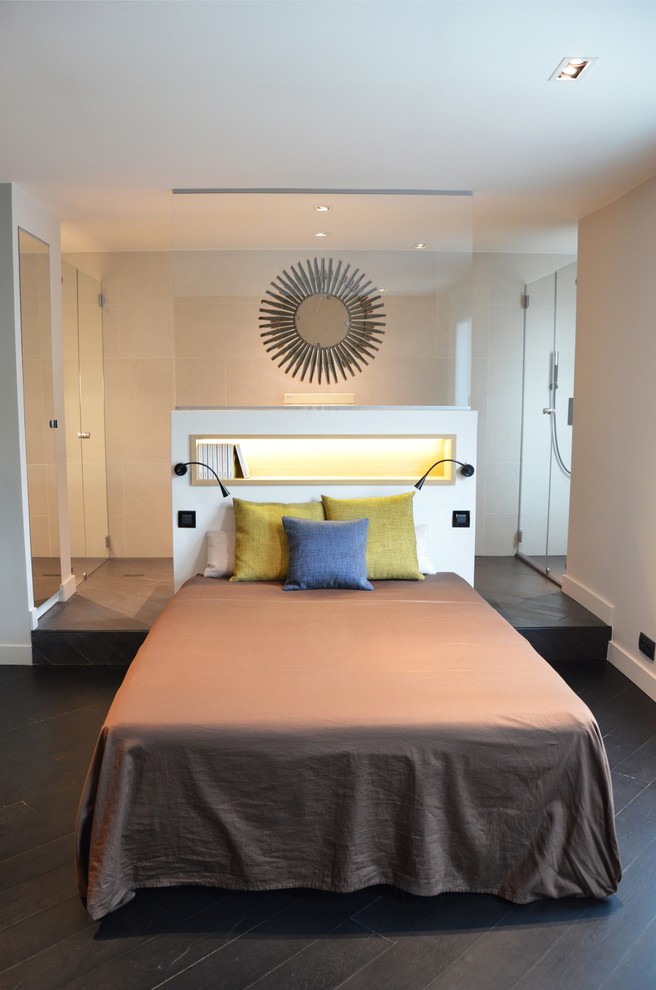 Photo of a medium sized contemporary master bedroom in Paris.