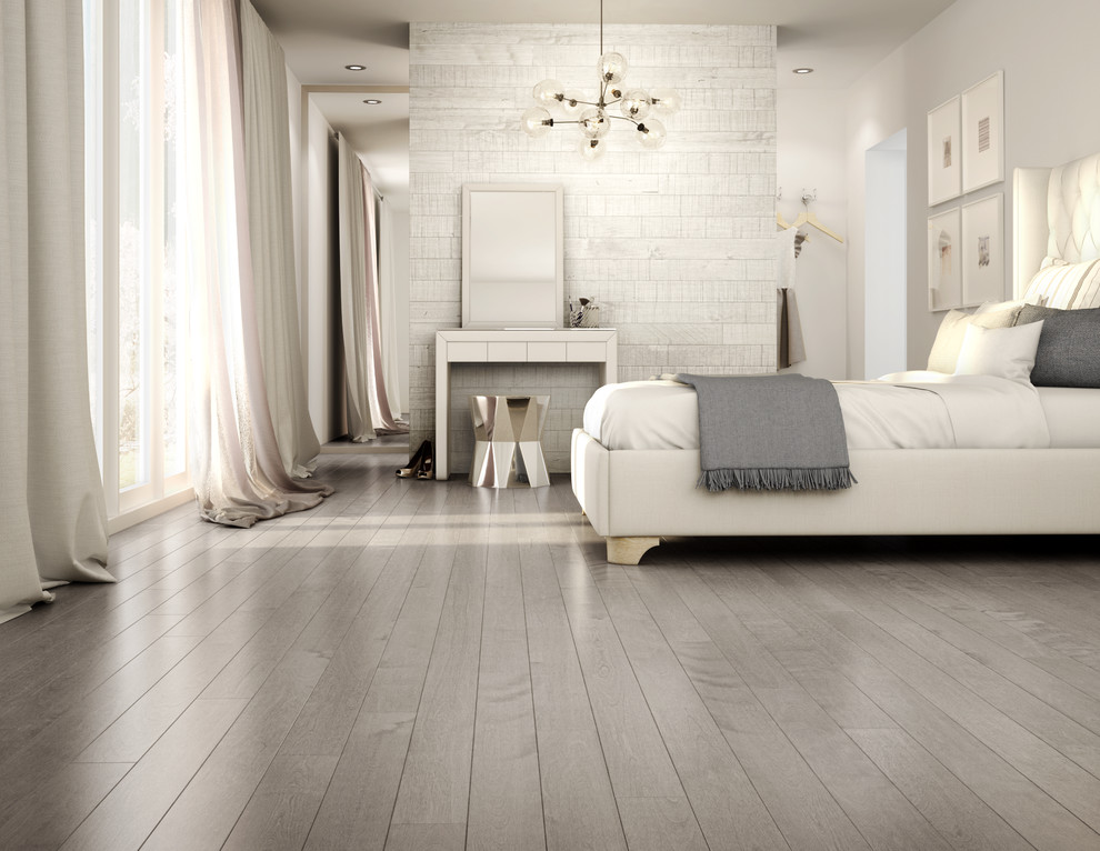 Modelo de dormitorio clásico con paredes grises y suelo de madera clara