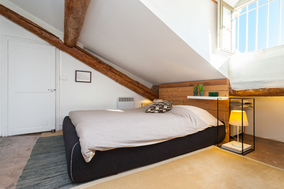 Diseño de dormitorio actual de tamaño medio sin chimenea con paredes blancas