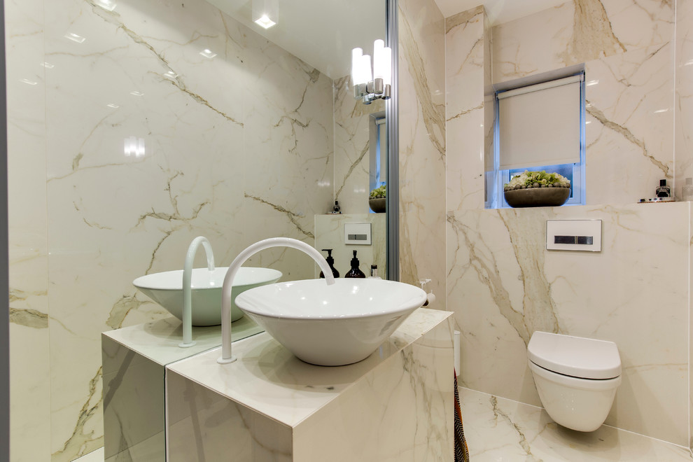 Inspiration for a small contemporary porcelain tile porcelain tile powder room remodel in London with a wall-mount toilet