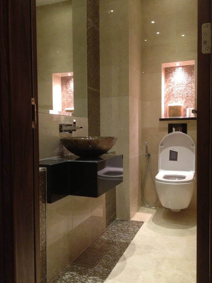 Inspiration for a contemporary powder room remodel in Other