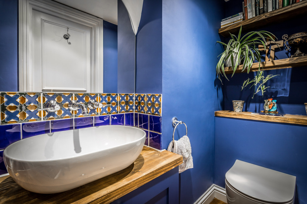 Example of a small classic powder room design in London