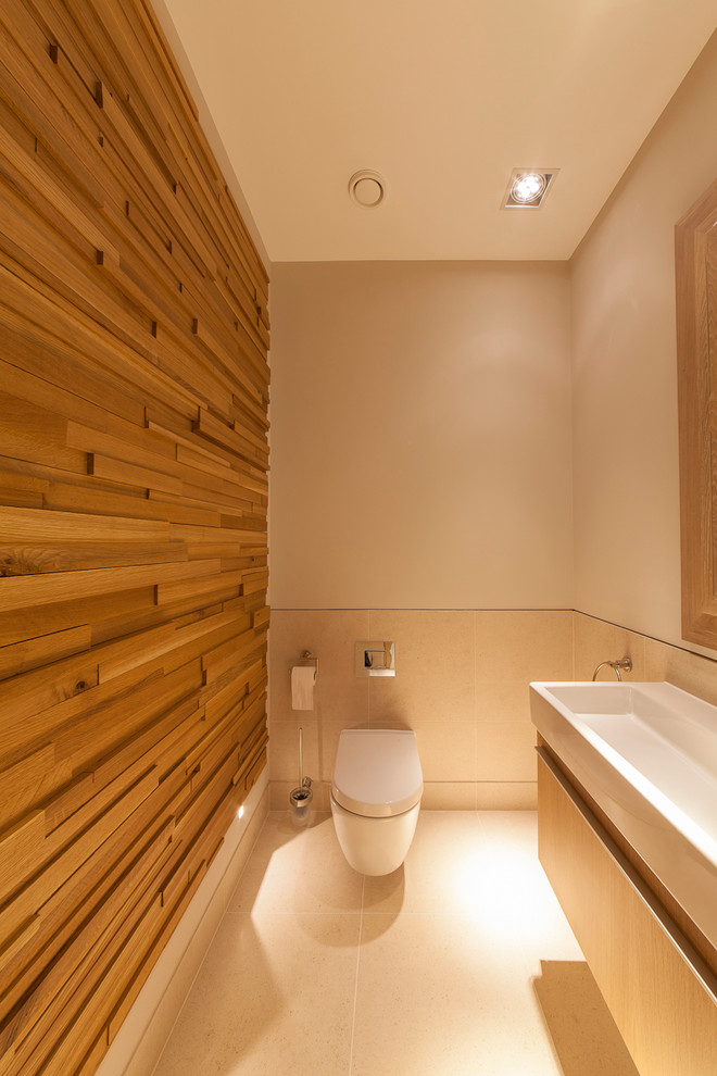 Cette photo montre un WC suspendu tendance de taille moyenne avec une grande vasque et un sol en carrelage de céramique.