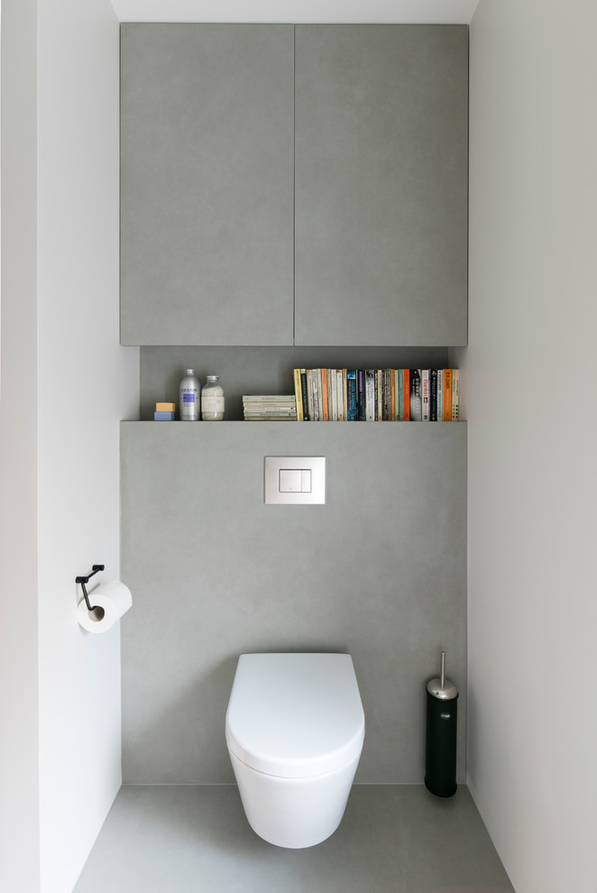 Example of a small transitional powder room design in London