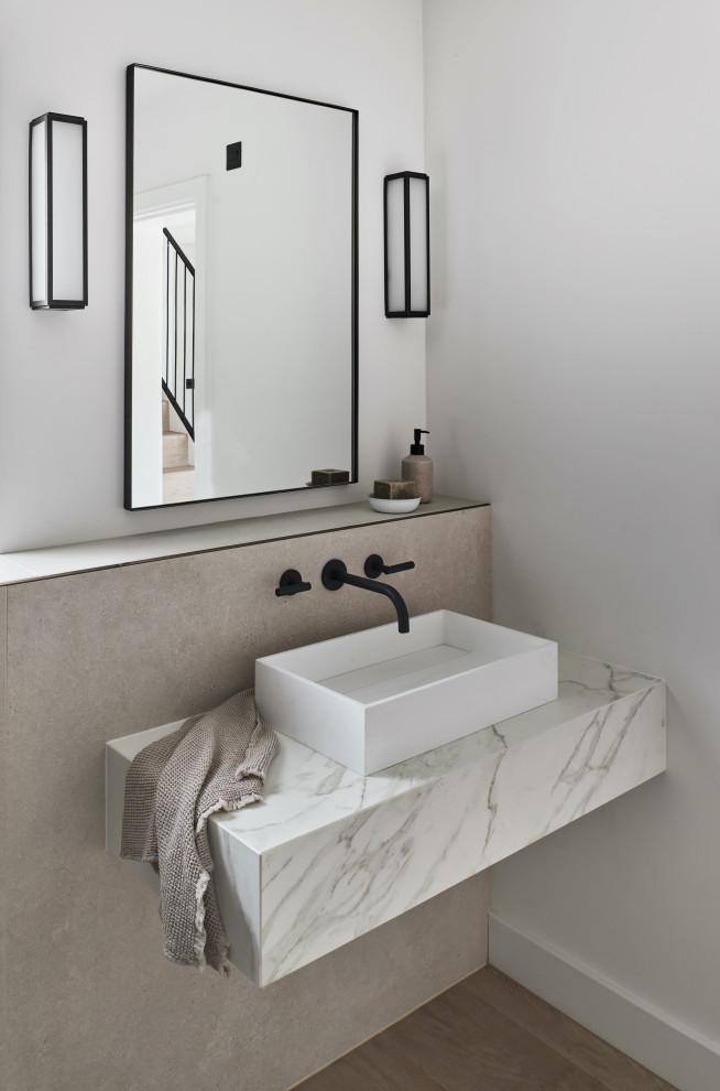 Inspiration for a modern powder room remodel in Other