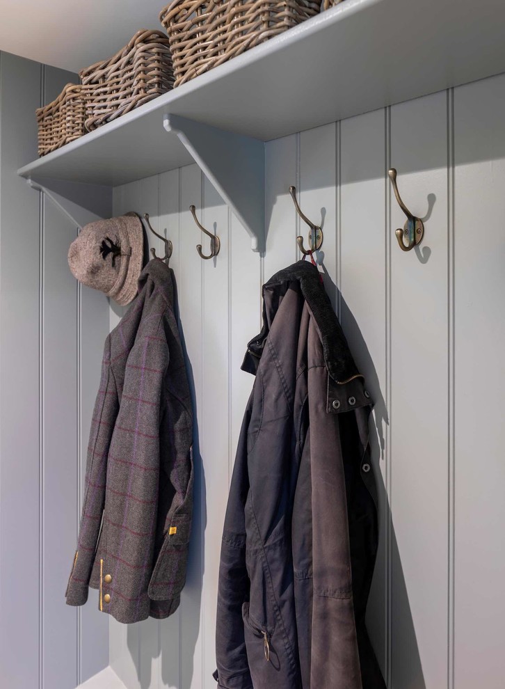 Inspiration for a small country cloakroom in Manchester with grey walls.