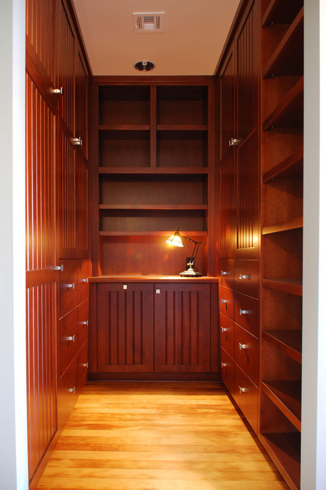 Inspiration for a craftsman closet remodel in San Diego