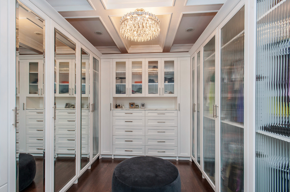 Contemporary wardrobe in Chicago with white cabinets.