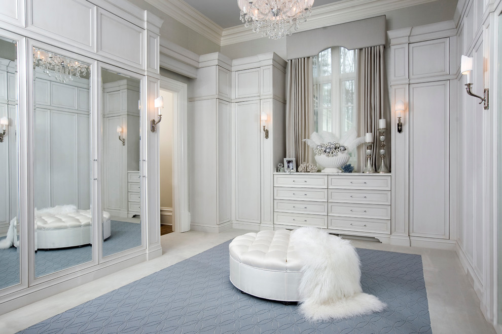 Example of a transitional walk-in closet design in Atlanta