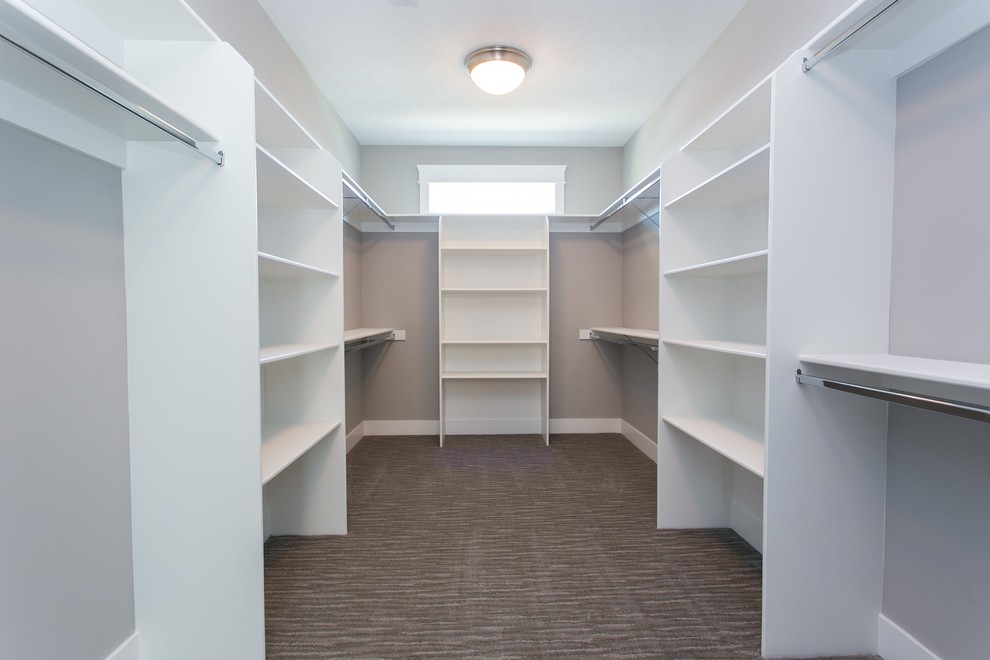 Example of a large transitional gender-neutral carpeted and gray floor walk-in closet design in Seattle with open cabinets and white cabinets