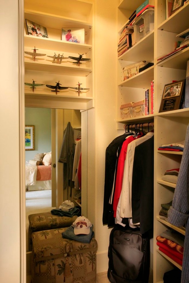 Example of a tuscan closet design in San Francisco