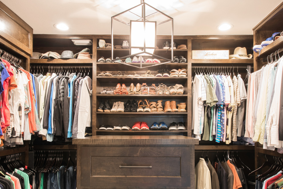 Inspiration for a mid-sized rustic closet remodel in Houston