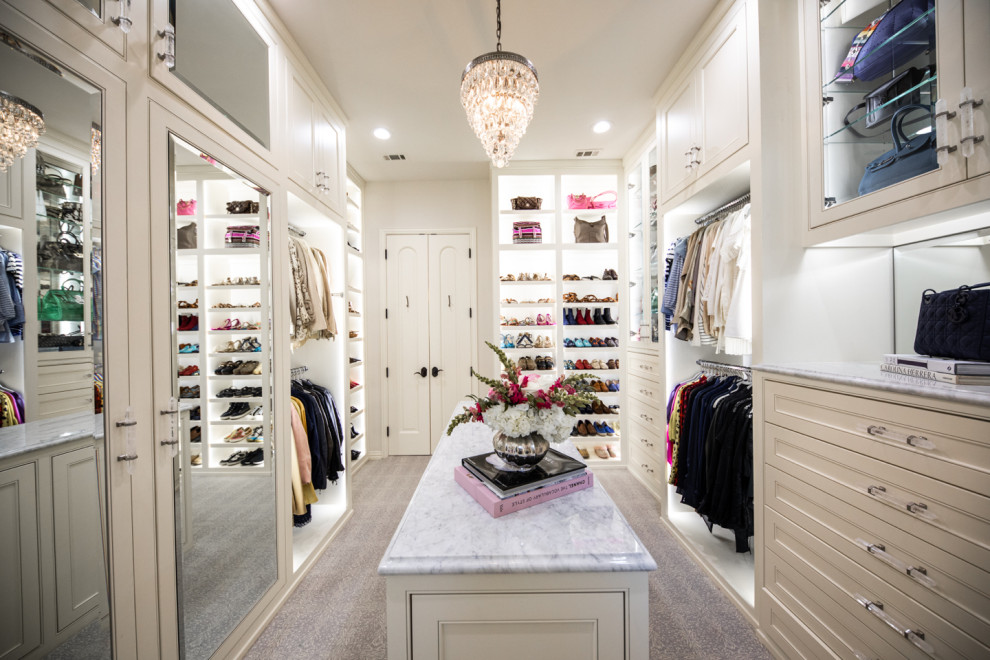 Example of a large classic women's carpeted and beige floor walk-in closet design in Dallas with beaded inset cabinets and white cabinets