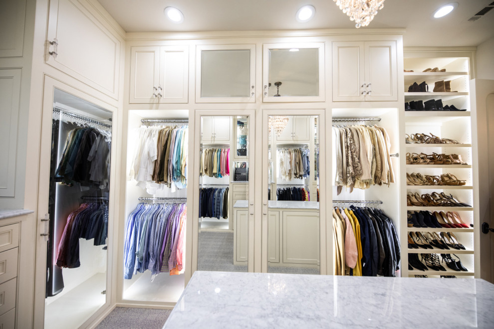 Large elegant women's carpeted and beige floor walk-in closet photo in Dallas with beaded inset cabinets and white cabinets