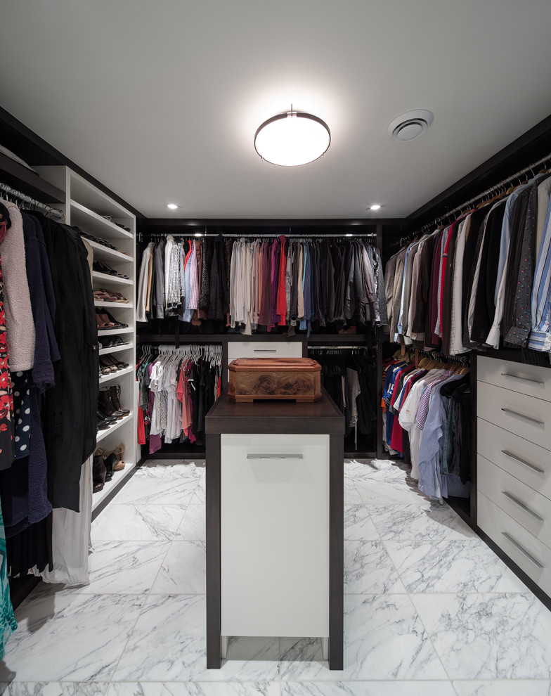 Large transitional gender-neutral marble floor walk-in closet photo in Ottawa with open cabinets