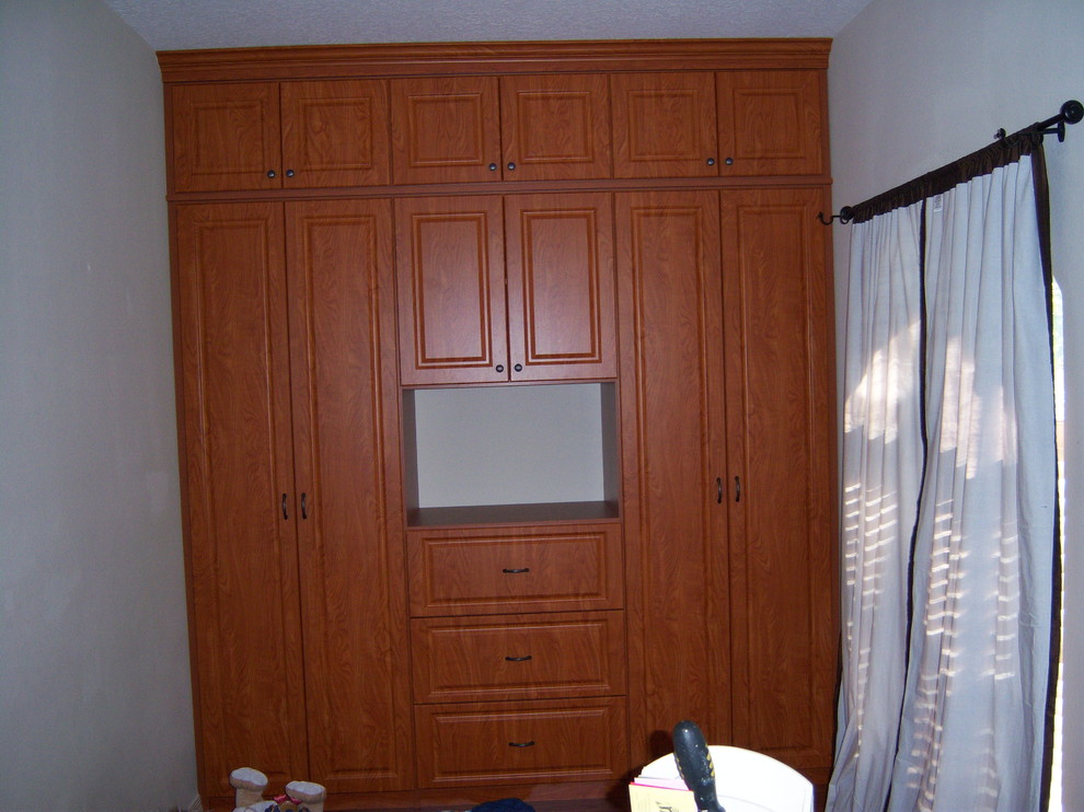 built in wardrobe/closet Closet Tampa by Artisan Closets and Trim