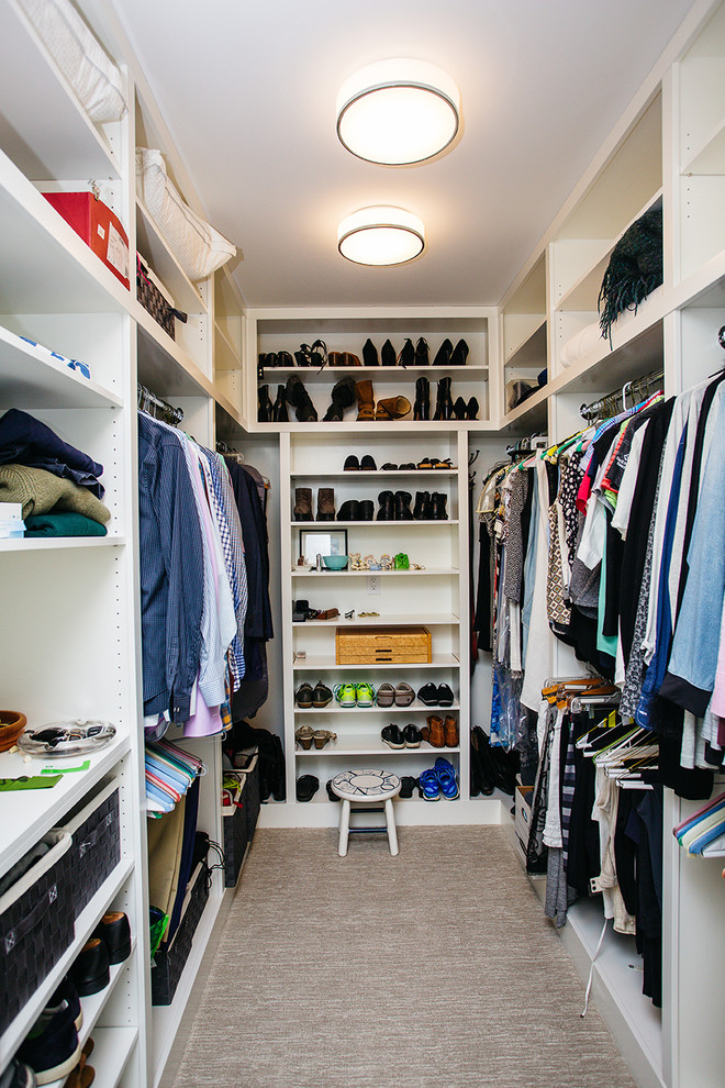 Inspiration for a mid-sized modern gender-neutral carpeted and beige floor walk-in closet remodel in Portland with open cabinets and white cabinets