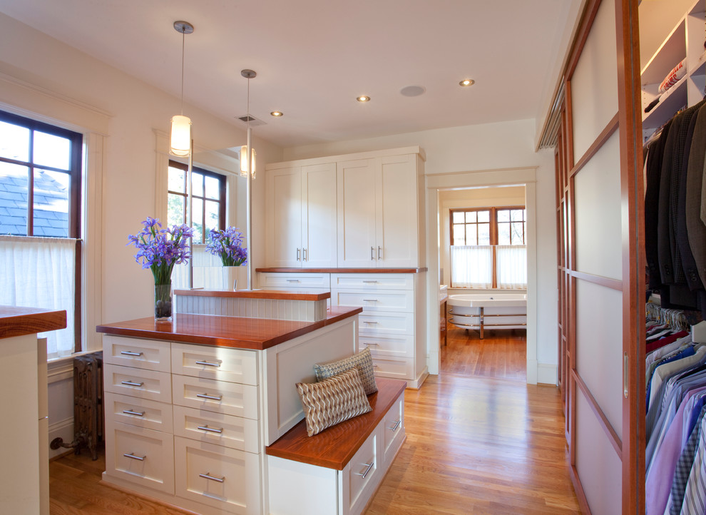 Example of a transitional dressing room design in DC Metro with recessed-panel cabinets and white cabinets
