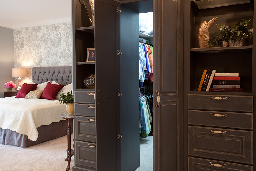 Inspiration for a large classic gender neutral walk-in wardrobe in Other with raised-panel cabinets, grey cabinets and carpet.