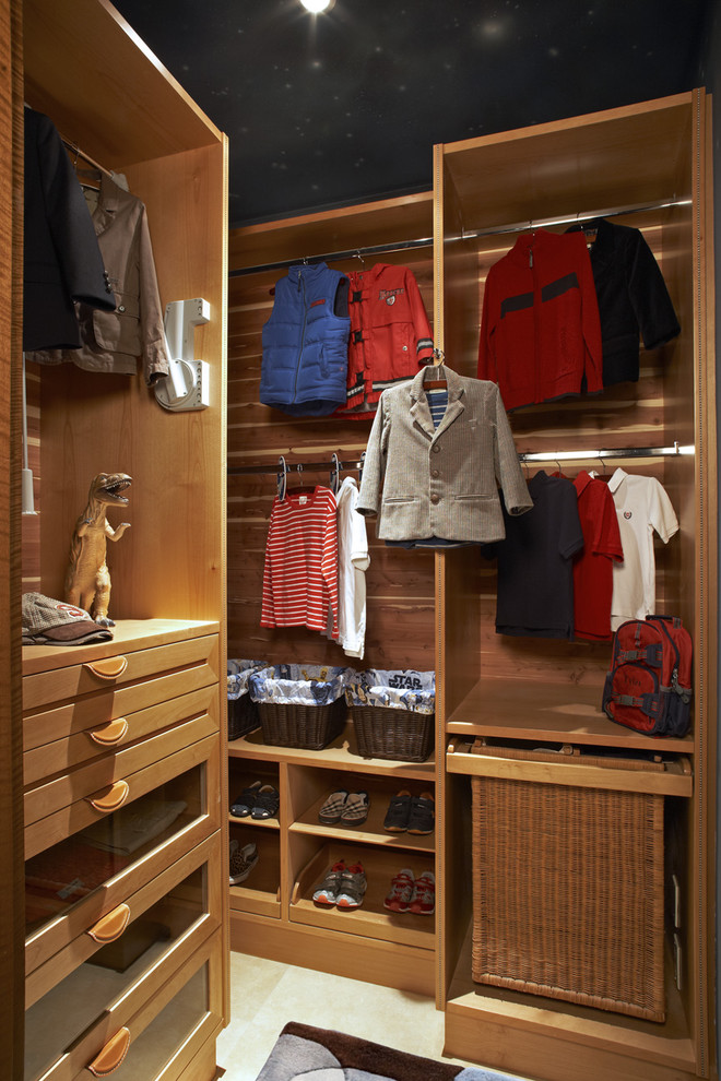 Trendy walk-in closet photo in Los Angeles with open cabinets and medium tone wood cabinets