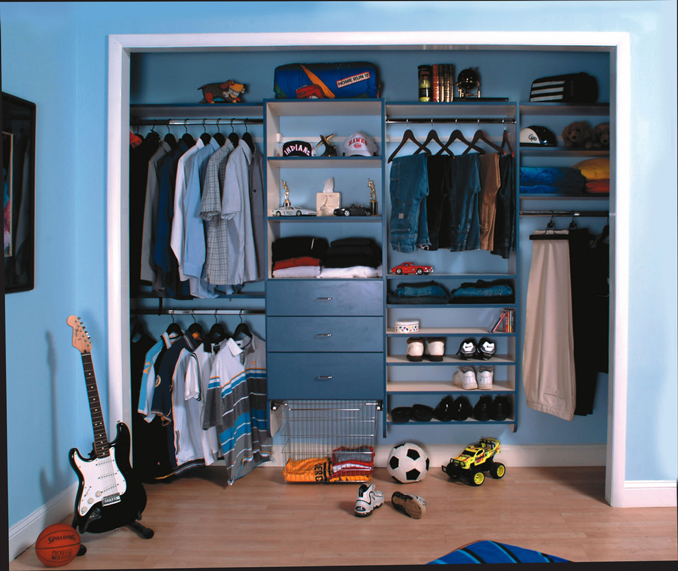 Example of a trendy light wood floor reach-in closet design in Philadelphia with open cabinets and blue cabinets