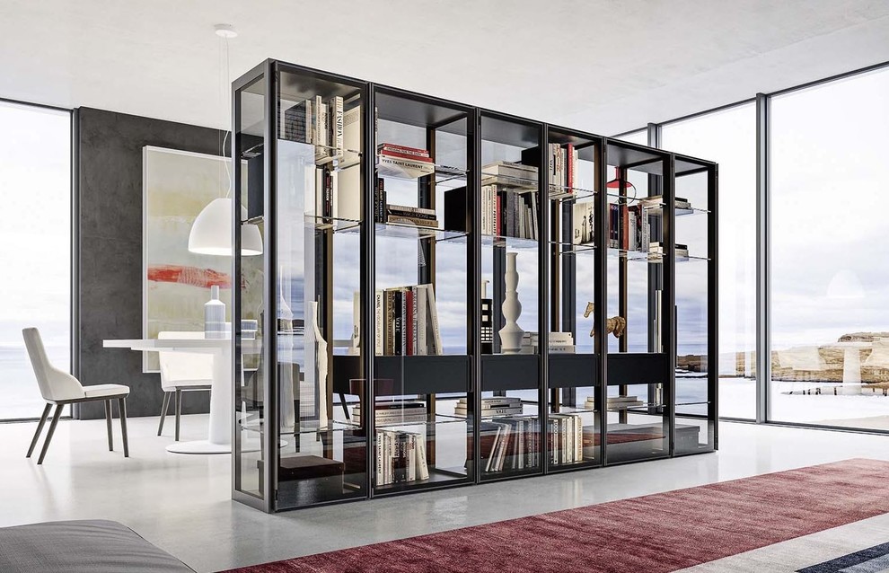 Inspiration for a large contemporary gender neutral standard wardrobe in Miami with glass-front cabinets, black cabinets, concrete flooring and grey floors.