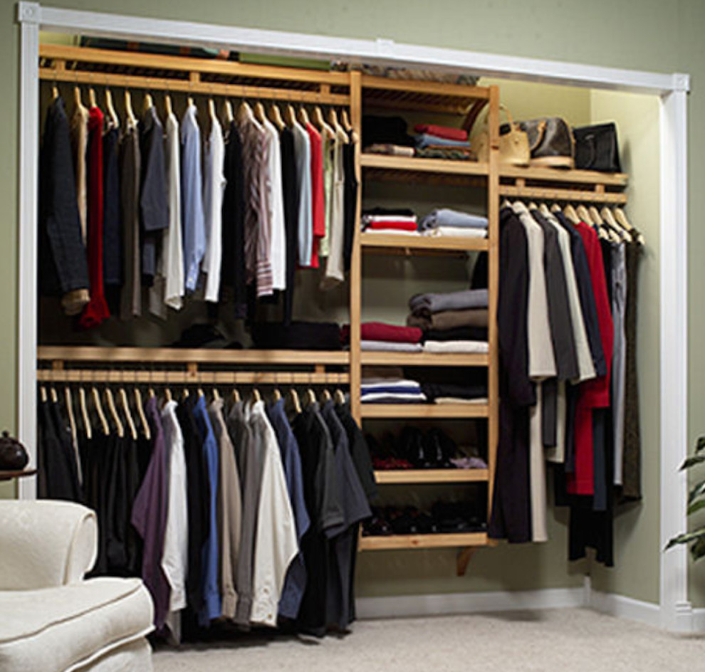 Large elegant gender-neutral carpeted reach-in closet photo in Other with open cabinets and light wood cabinets