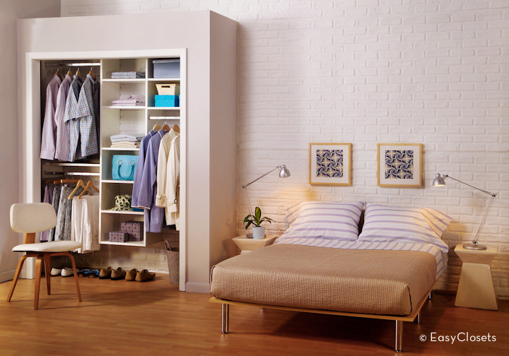 Example of a minimalist reach-in closet design in Grand Rapids