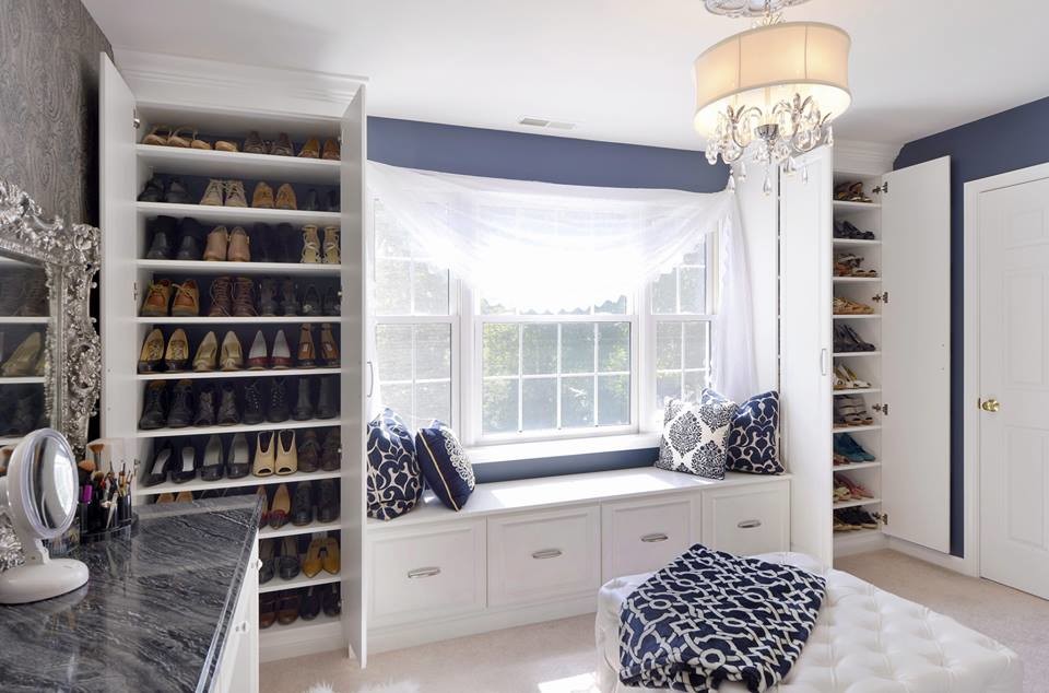 Walk-in closet - large shabby-chic style women's carpeted and beige floor walk-in closet idea in Philadelphia with raised-panel cabinets and white cabinets
