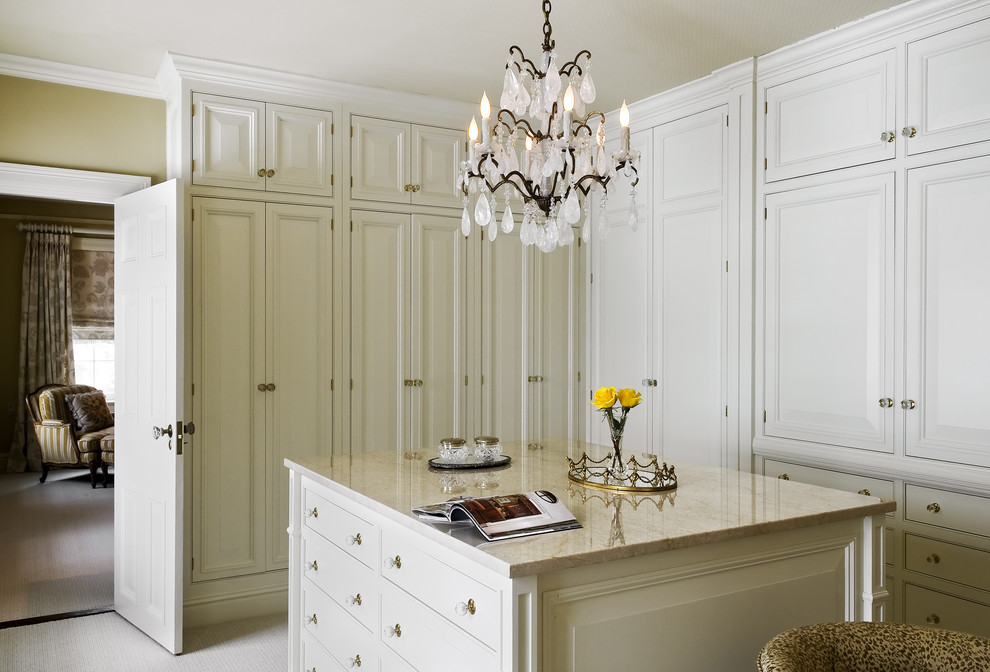 Inspiration for a timeless carpeted dressing room remodel in New York